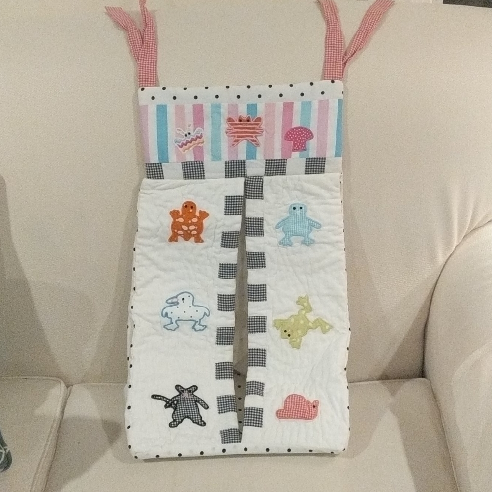 Mackenzie Childs diaper stacker/caddy